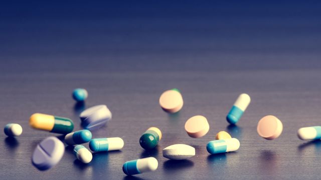 Colorful tablets symbolizing the study of drug exposure in patients. 