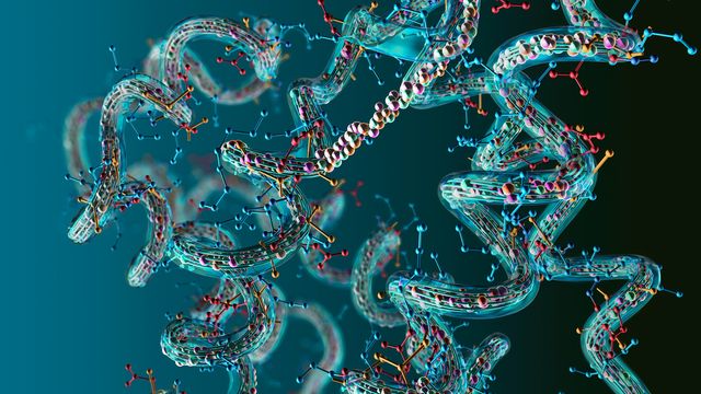 3D molecular visualization of a protein structure. The background is green and there is an assortment of red, yellow, blue and pink ball and stick molecules. 