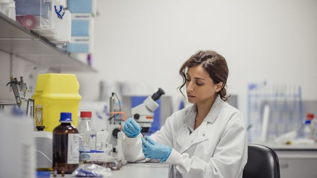 Scientist working in a laboratory, illustrating the advanced research supported by the BOC Sciences glycan portal. 